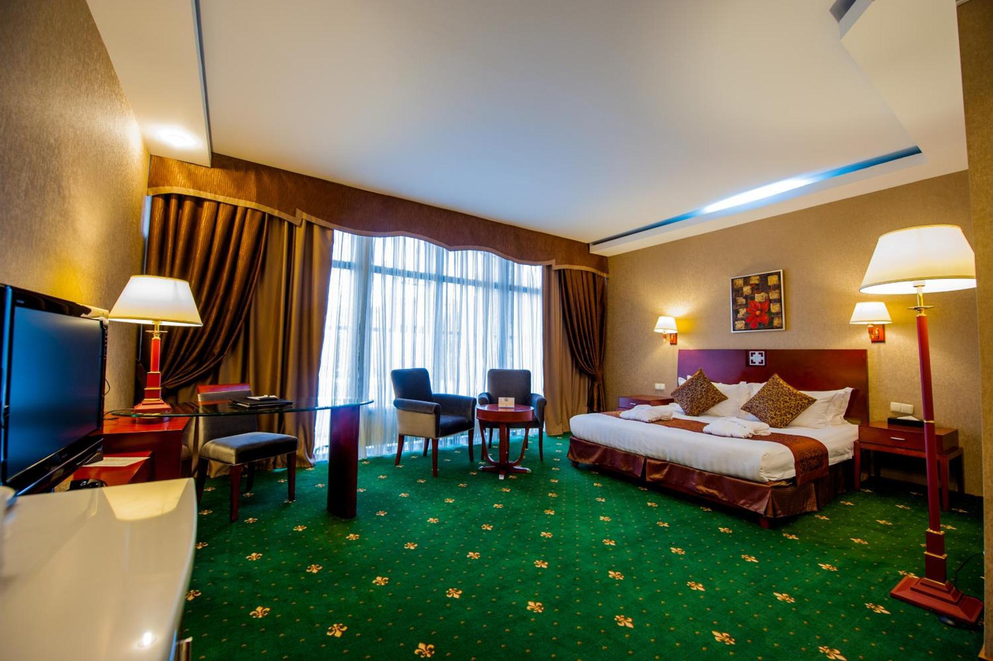 Goldman Empire Hotel Astana Kamer foto
